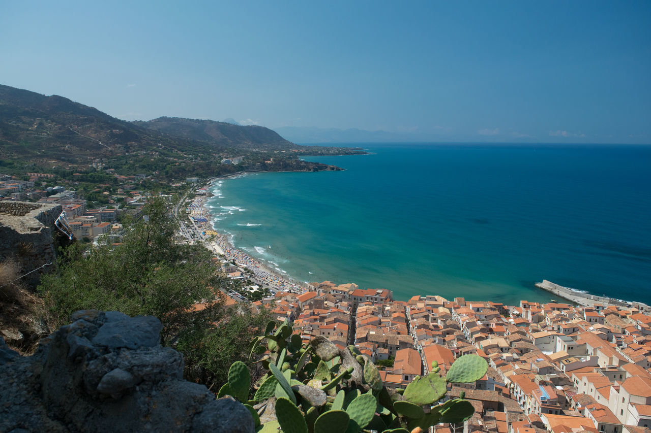 sea, water, high angle view, horizon over water, scenics, outdoors, sky, beach, beauty in nature, nature, architecture, no people, day