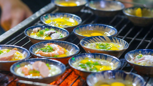 Banh can or can cake in the ho thi ky street, ho chi minh city, vietnam