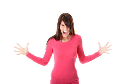 Portrait of smiling young woman against white background