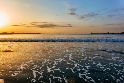 Scenic view of sea against sky during sunset
