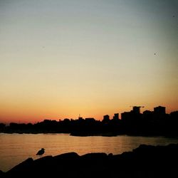 Scenic view of sunset over river