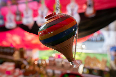 Close-up of ice cream hanging for sale