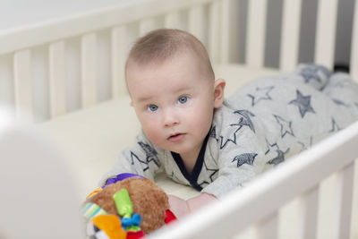 Portrait of cute baby boy at home