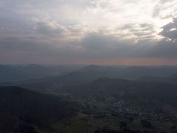 Scenic view of mountains against sky during sunset