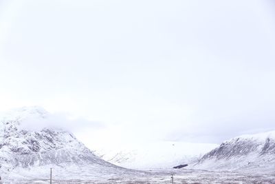 Scenic view of snow covered mountains