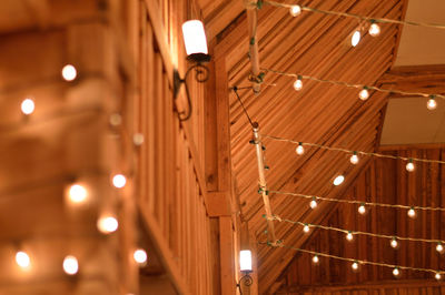 Low angle view of illuminated decorations in building