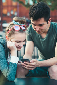 Young man using mobile phone