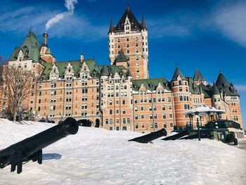 Buildings in city during winter