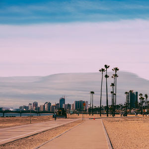 View of beach walkway sunset