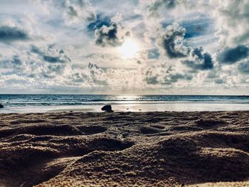 Scenic view of beach against sky