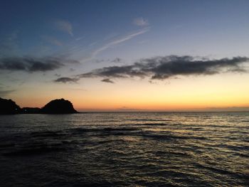 Scenic view of calm sea at dusk