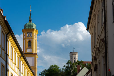 Low angle view of buildings against sky in city