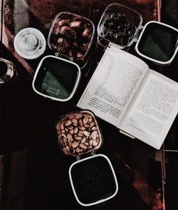 Directly above shot of food and book on table