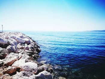 Scenic view of sea against clear sky