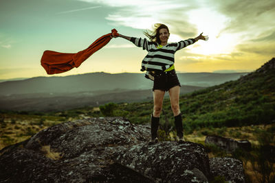 Woman with cloth in the wind