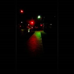 Illuminated street light at night