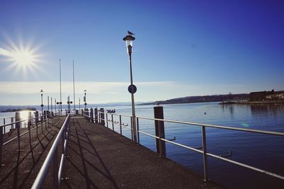 Pier on sea against sky