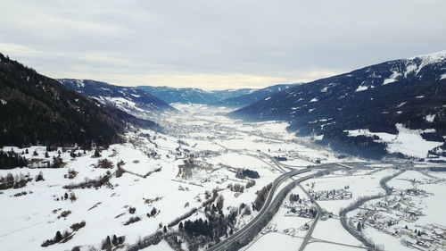 Scenic view of snowcapped mountains against sky