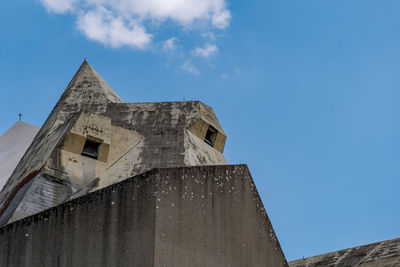 Low angle view of old building against sky