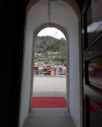 Buildings seen through train window