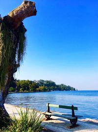 Scenic view of sea against clear blue sky