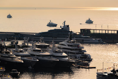 Boats moored at harbor