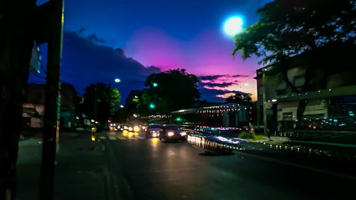 Illuminated street light at night