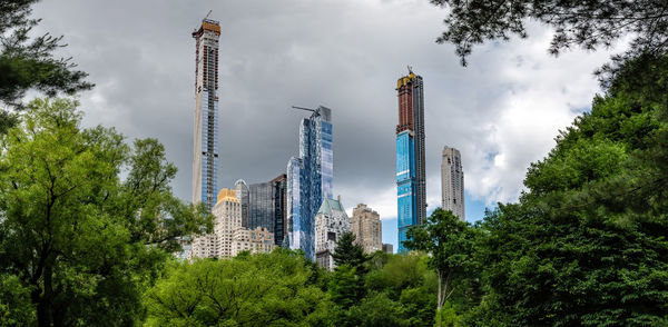 Low angle view of modern buildings against sky