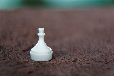 Close-up of chess on table