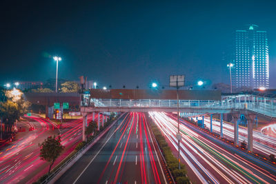 Light trails on city street at night