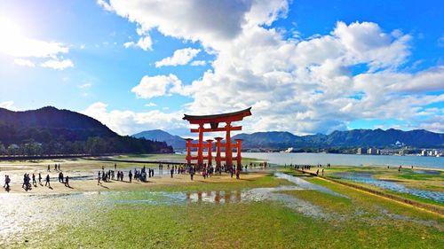 Scenic view of mountains against cloudy sky
