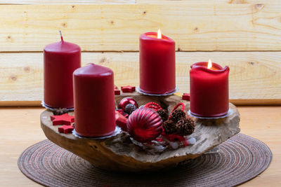 Close-up of tea light candles on table