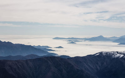 Aerial view of mountains in foggy weather