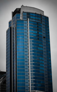 Low angle view of modern buildings against clear sky