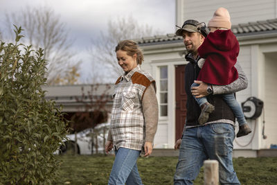 Couple standing outdoors