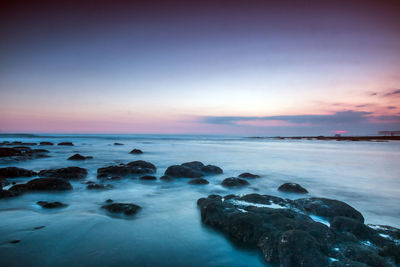 Scenic view of sea against sky during sunset