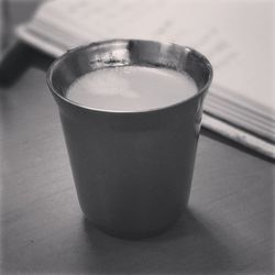 Close-up of coffee cup on table