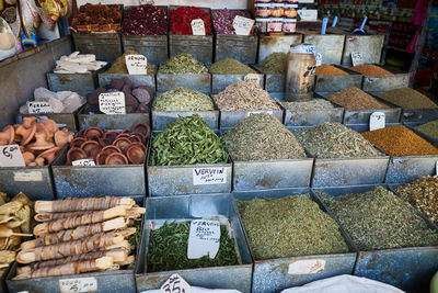 A variation of dried teas, herbs and spices outside a market stall in fez, morocco