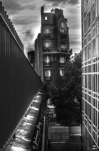 Modern buildings against sky in city