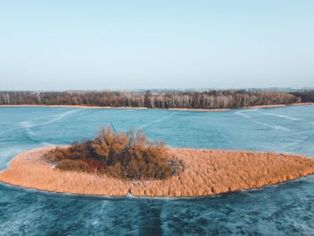 Scenic view of lake against clear sky