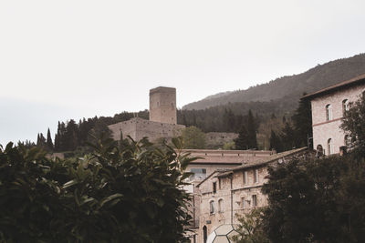 Old buildings against clear sky