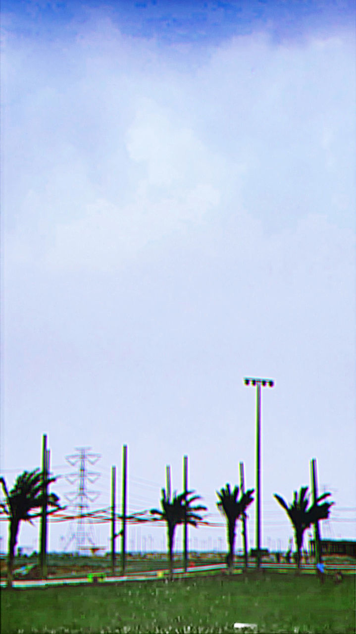 VIEW OF CROSS AT CEMETERY