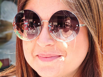 Portrait of woman wearing sunglasses