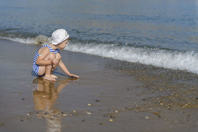 Full length of boy on beach