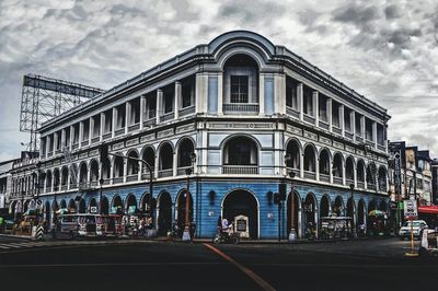 View of historical building against cloudy sky