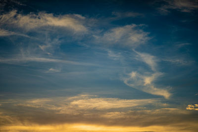 Low angle view of cloudy sky during sunset