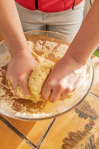 Close-up of hand holding ice cream