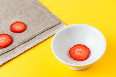 High angle view of fruits in plate on table