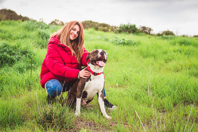 Portrait of a dog on field