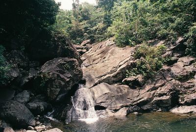 Scenic view of river amidst rock formation